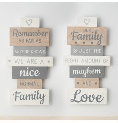 An assortment of 2 wooden plaque signs each featuring a fun quote about families with heart details. 