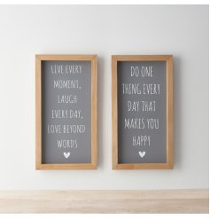 An assortment of framed quotes, each with a stylish grey background, inspiring quote and heart motif. 
