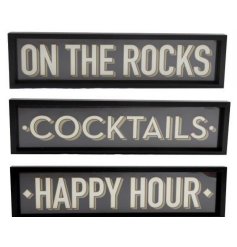 An assortment of 3 wall art signs, each displaying a different word