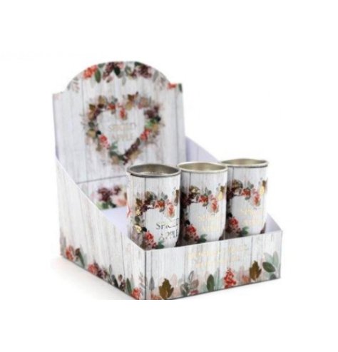 Encased in a heart wreath design tin, a spiced apple scented oil