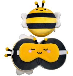 a plush travel pillow and eye mask in a bee design