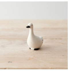 A unique miniature duck decoration with a smooth finish and speckled design. A charming sentiment gift item and keepsake
