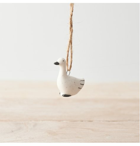 neutral duck hanging decoration made from porcelain with intricate detailing.