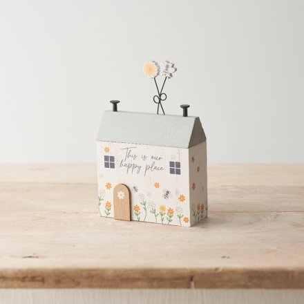 A sweet wooden house decoration with "this is our happy place" text and 3D detailing including flowers and bees. 