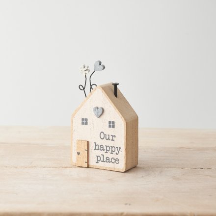 A charming wooden house block with cute heart & floral detailing and "our happy place" text. 