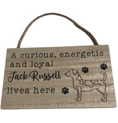 A hanging wooden sign with "a curious, energetic and loyal Jack Russell lives here" message with paw print details. 