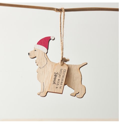 A wooden hanging Spaniel shaped decoration with "Christmas is better with a Spaniel" tag and colourful Santa hat. 