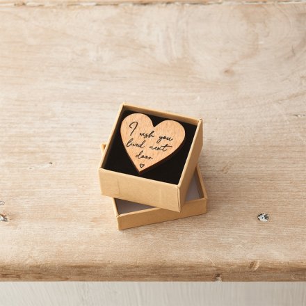 I wish you lived next door. A charming natural wooden heart shaped token with a sentimental slogan. 