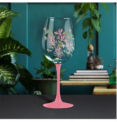 floral wine glass with a honeysuckle and bee illustration