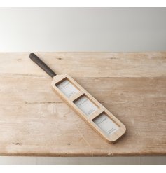 wooden photo frame in the shape of a cricket bat 