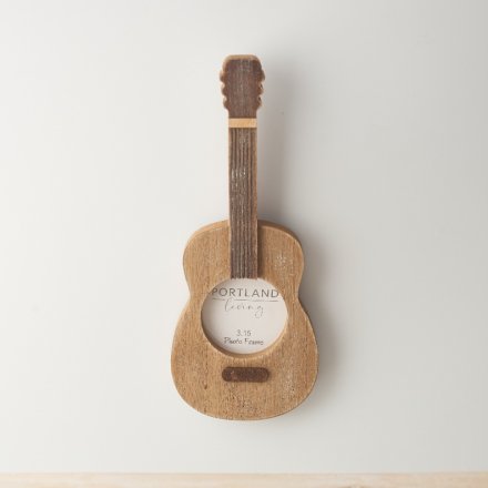 rustic styled photo frame in the shape of a guitar 