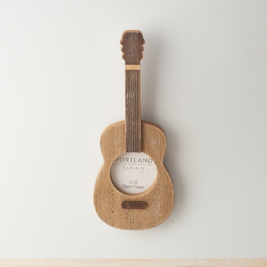 wooden photo frame in the shape of a guitar