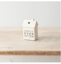 A simple yet stylish porcelain house decoration with "happily every after" message alongside a cute heart motif. 