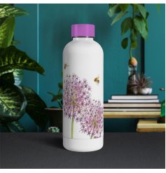 floral water bottle in a bright pink and white, with a screw top lid 