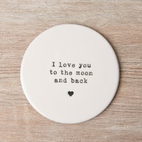 A stylish porcelain coaster with a popular slogan embossed with stamp style text.