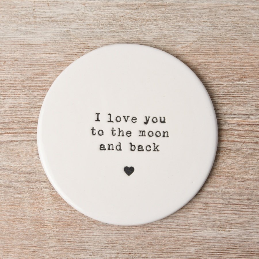 A stylish porcelain coaster with a popular slogan embossed with stamp style text.