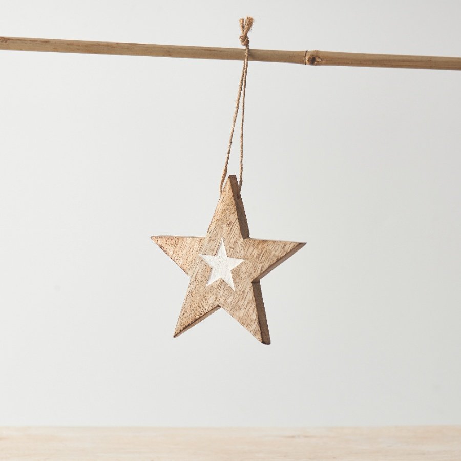 A simple yet stylish star decoration with contrasting whitewashed star detail, finished with a twine hanger. 