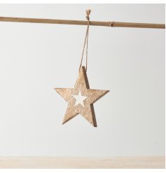 A cute star hanging decoration with contrasting whitewash star design detail.