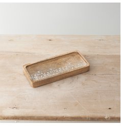 A rustic tray made from mango wood. Beautifully detailed with natural grain and an etched floral design. 