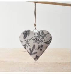 A stylish metal heart hanger with a winter foliage decal. Complete with rustic jute hanger 