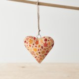 A chic metal heart with a stylish autumn leaves design in rich orange, ochre and brown colours. 