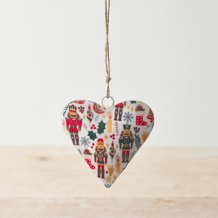 A colourful metal hanging heart with a traditional nutcracker decal on each side. A great tree ornament 