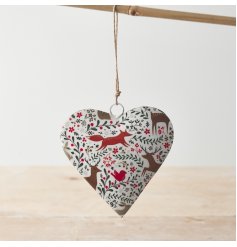 A charming metal heart hanger with jute string. Decorated with a woodland animal and winter berry decal. 