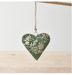 A pretty botanical hanging heart in a rich green hue. Complete with a jute string hanger. 