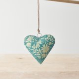 A chic metal heart decoration with a jute string hanger. 
