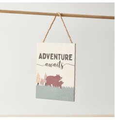 A stylish, woodland inspired wooden sign with an Adventure Awaits slogan and jute hanger. 