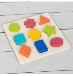 an educational puzzle featuring different shapes in a variety of colours