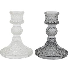 A elegant glass candle holder in 2 assorted designs. 