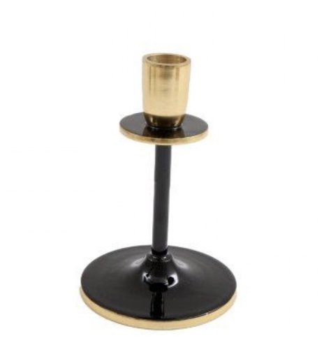A candlestick in contrasting black and gold tones. 