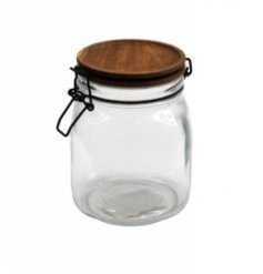 Glass storage jar with a natural acacia lid for simple storage.