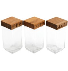 A simplistic collection of 3 assorted glass jars. display these in the kitchen and fill with tea, coffee and sugar