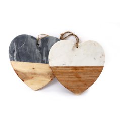 2 assorted chopping boards in a cute heart shape design. Detailing half marble and half wood effect