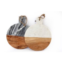 2 assorted designs of a rustic circular chopping board.. It features half marble effect half wood with a jute string 