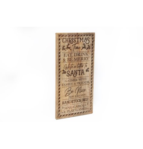 A rustic traditional wooden plaque displaying laser cut Christmas phrases