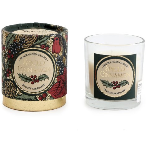 A spiced cinnamon scented candle pot with festive flowers detailed on the front and packaging. 