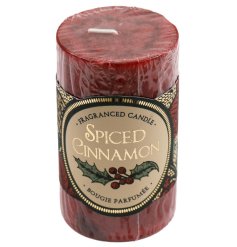 A mottled pillar candle in a traditional spiced cinnamon fragrance.
