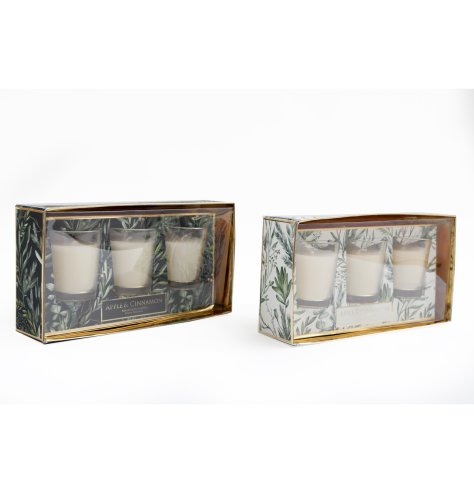 A festive scent of candles displayed in a foliage gift box. Apple and Cinnamon fragrance. 