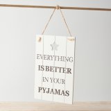 A shabby chic wooden plaque featuring a bold scripted text decal with a cut out star motif.