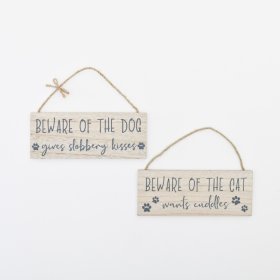 Beware of the Cat and Beware of the Dog signs in white and grey with paw print decals.