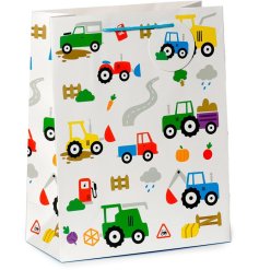 A large gift bag illustrated with multiple colourful tractors, vegetables and different road signs,