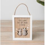 A charming wooden sign featuring two cats sat side by side together. 