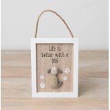A wooden hanging sign displaying 'Life is Better with a Dog' text and a dog made from pebbles.