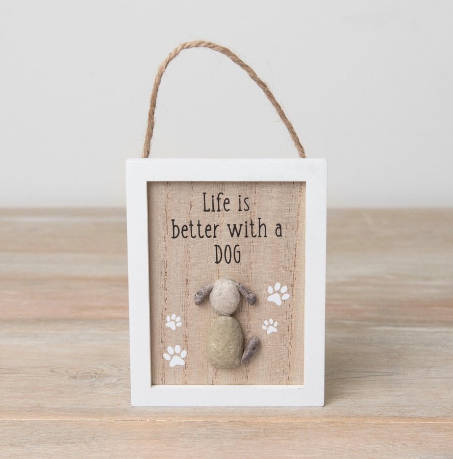 A rustic wooden sign hung from twine with 'Life is better with a DOG' wording and a pebble dog design.