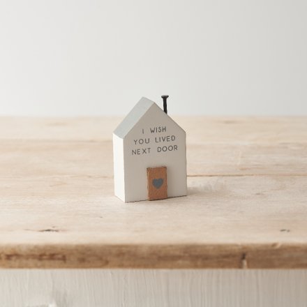 A cute mini house decoration perfect for a gift idea for a family member or friend.