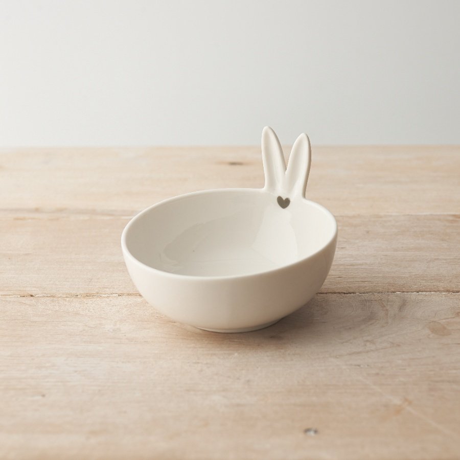 A dainty trinket dish with bunny ears that is the perfect addition to any room this easter