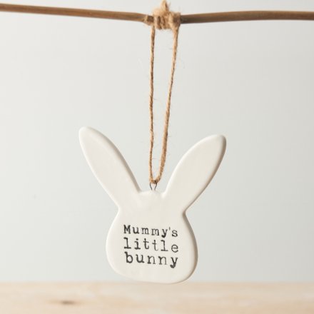 A charming and unique bunny shaped porcelain decoration with a cute stamped slogan. 
